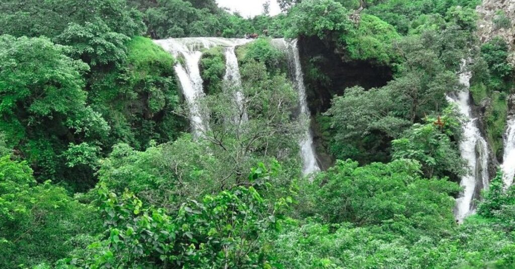 Hathni Waterfall lush green valley view near Ahmedabad | Taxi Service in Ahmedabad