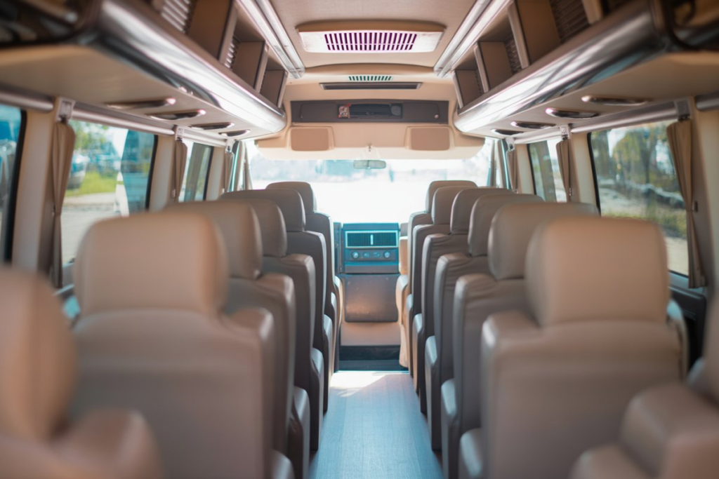 17 seater tempo traveller Ahmedabad interior - luxury push-back seats with AC